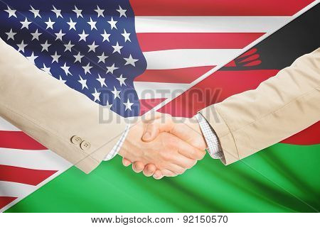 Businessmen Handshake - United States And Malawi