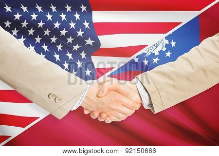 Businessmen Handshake - United States And Bhutan