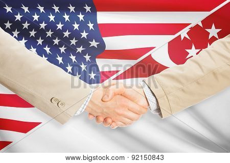 Businessmen Handshake - United States And Singapore