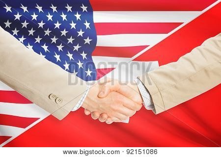 Businessmen Handshake - United States And Switzerland