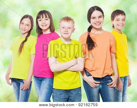 Happy group children at summer. Smiling teen. Frendship boys and girls
