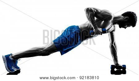 one caucasian man exercising fitness plank position exercises in studio silhouette isolated on white background