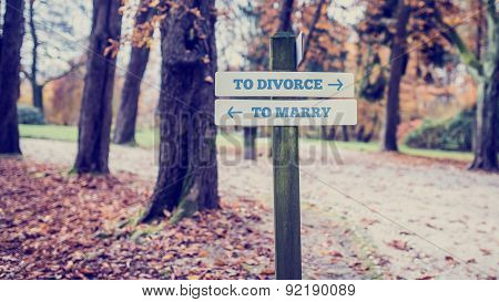 Park Signpost For To Divorce And To Marry Concept
