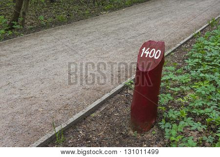 The post the dirt on a treadmill means that you ran for 1400 meters. Sokolniki Park. Moscow. Russia.