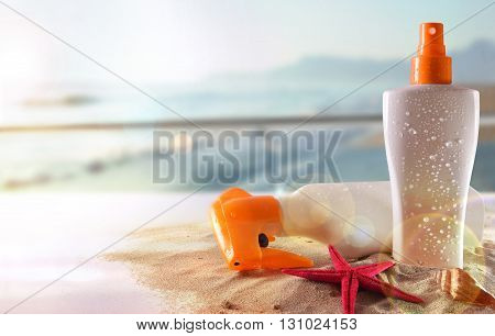 Two Sunscreen On Table In Terrace Overlooking Beach