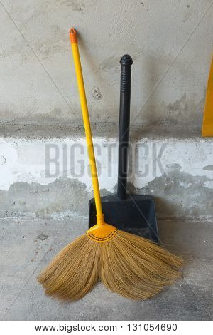 dustpan and broom for cleaning in house