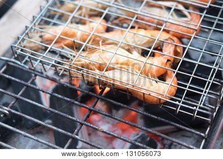 Grilled fresh  shrimps on grill. Close up