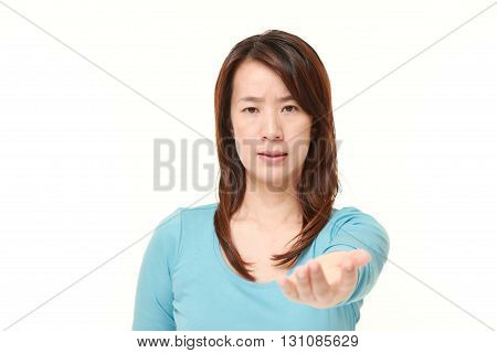 portrait of angry Japanese woman requests something on white background