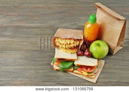 Kid school lunch on wooden background