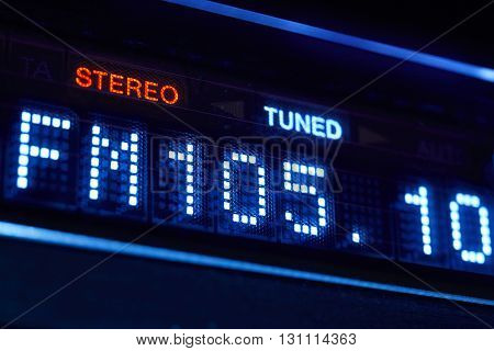 FM tuner radio display. Stereo digital frequency station tuned. Horizontal