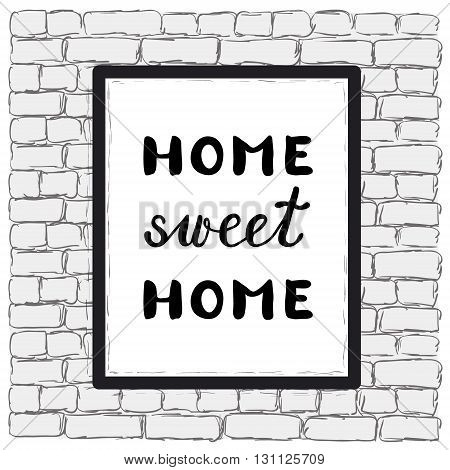 Home sweet home. Poster in a frame on a brick wall. Brush hand lettering. Great for posters home decor and more.