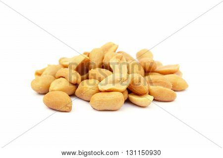 Roasted salted peanuts isolated on a white background
