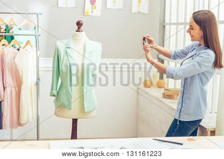 Beautiful Young Designer With Gadget