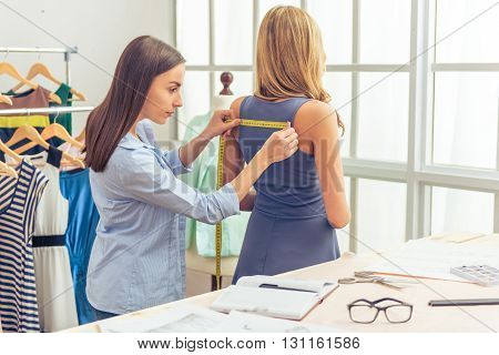 Beautiful Young Designer And Client