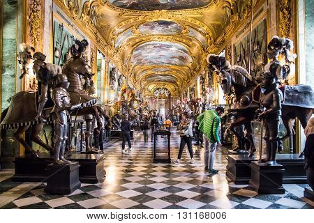 TURIN ITALY - APRIL 25 2016 - Visitors at the Royal Armoury of Turin one of the world's most important collections of arms and armour located in the Royal Palace.