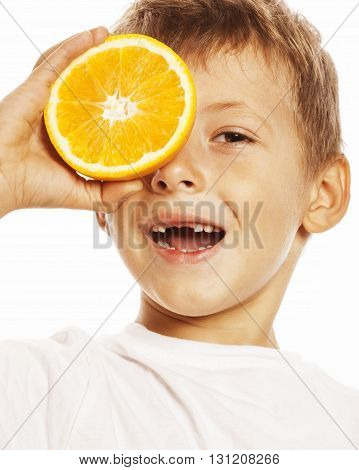 little cute boy with orange fruit double isolated on white smiling without front teeth adorable kid cheerful close up
