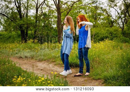 Best friends forever. Girlfriends spend time together in the park. BFF. Close friends. Gentle friendship.