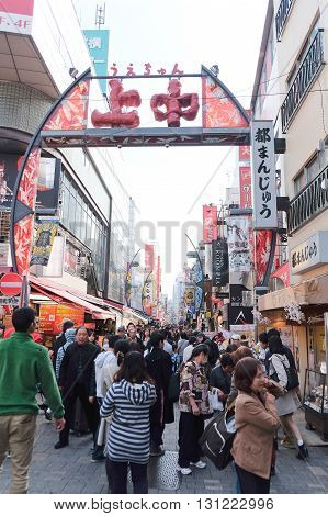 TOKYO, JAPAN - MARCH 29, 2016 : Crowded and busy Ameyoko shopping street on 29 March 2016.Today, various products such as clothes, bags, cosmetics, fresh fish, dried food are sold along Ameyoko.