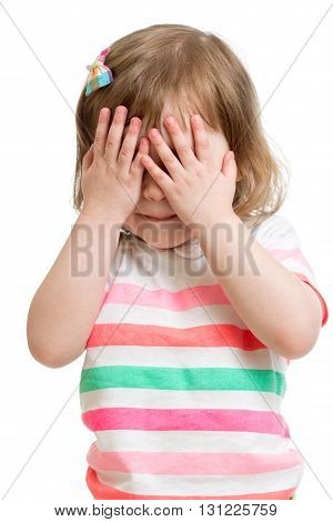 child hiding face by hands isolated on white
