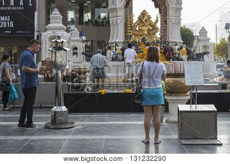 BANGKOK THAILAND - APR 17 : people worship in Ganesha shrine at Central world in Ratchaprasong area on april 17 2016. Thailand. Ganesha shrine is one of sacred item in Ratchaprasong area