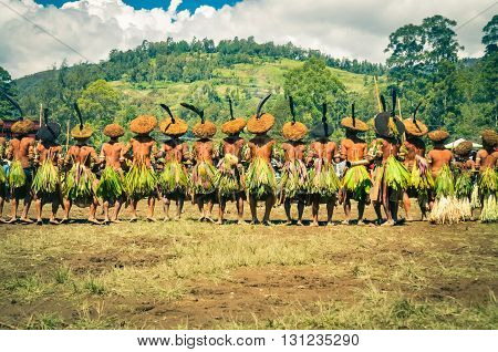 Long Row Of Men In Papua New Guinea