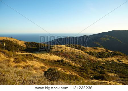 Panoramic view of meadows, hills and sky in Malibu Creek State Park, California