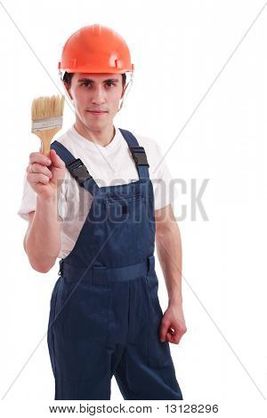 Muscolare uomo giovane in un generatore uniforme con strumenti.