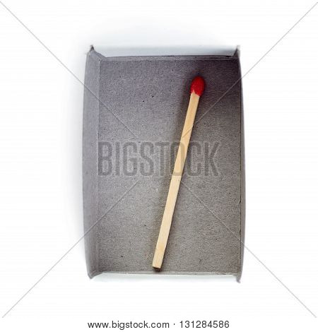 One Wooden unused match in box isolated over the white background