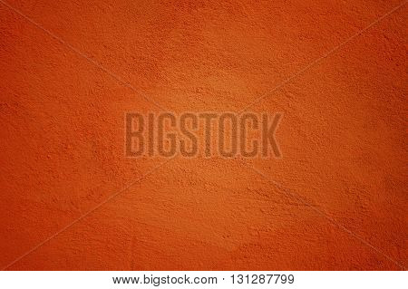 Background Made of Painted Wall in Ocher Color with Vignette