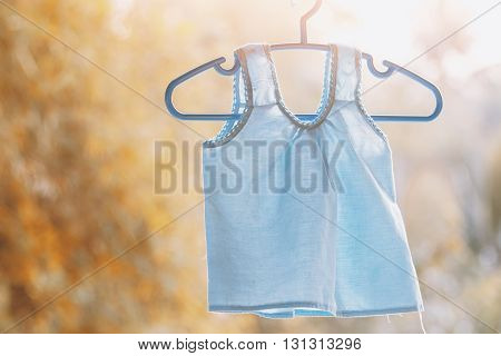 Old-fashion Thailand style cloth on hangers Vintage color