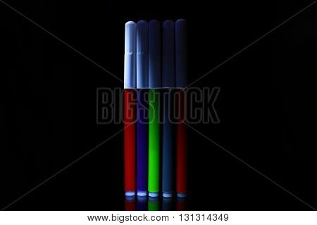 Colored Marker Pens Photo of colored marker pens in dark