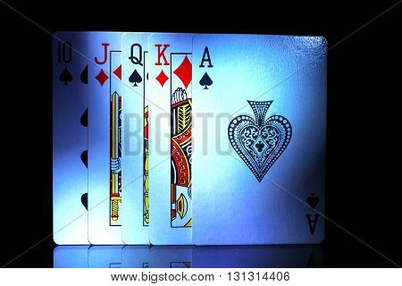 some of play cards from ten to ace in dark
