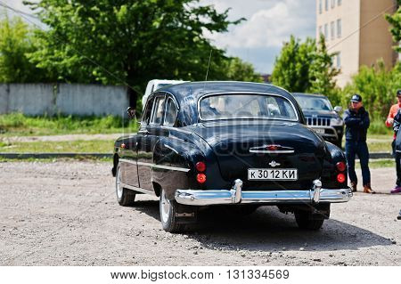 Podol, Ukraine - May 19, 2016: Back View Of Goes On Road Gaz-12 Zim, Luxury Soviet Limousine