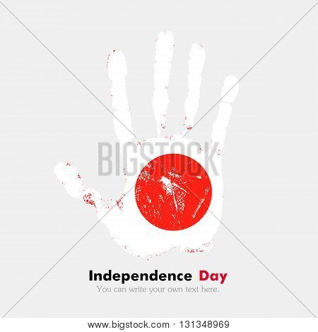 Hand print, which bears the Flag of Japan. Independence Day. Grunge style. Grungy hand print with the flag. Hand print and five fingers. Used as an icon, card, greeting, printed materials.