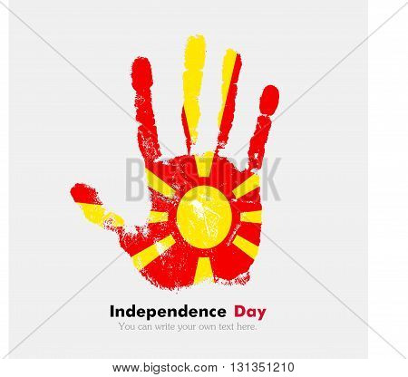 Hand print, which bears the Flag of Macedonia. Independence Day. Grunge style. Grungy hand print with the flag. Hand print and five fingers. Used as an icon, card, greeting, printed materials.