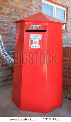 PRINCIPALITY OF HUTT RIVER,WA,AUSTRALIA-APRIL 20,2016: Red old fashioned mailbox in the Sovereign State, the Principality of Hutt River, independent oldest micro nation located in Western Australia.