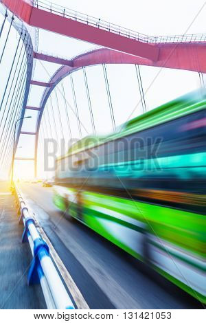 motion blurred traffic on the yangtse river bridge,chongqing china.