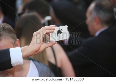 CANNES, FRANCE - MAY 21:  Fashionable items attends the 'Elle' Premiere during the 69th annual Cannes Film Festival at the Palais des Festivals on May 21, 2016 in Cannes, France.