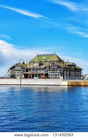 HELSINGBORG SWEDEN - APRIL 25 2016: Helsingborg harbour and the recently flitted Tivoli night club that used to be one of the towns old train stations.