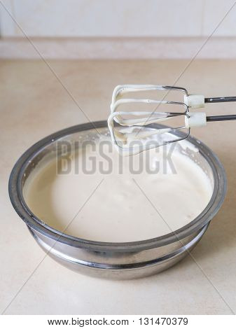 Eggs And Sugar In Mixing Bowl