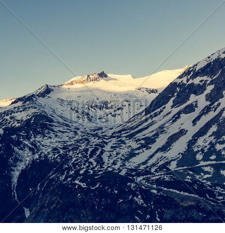 Snowy mountains in the morning. Malta valley in Austria.