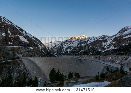 Mountain hydro dam in the morning. Malta valley in Austria.