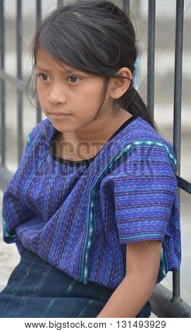 SANTA CATARINA PALOPO DE ATITLAN GUATEMALA NAY 01 2016: Portrait of a Mayan child in blue huipil. The Mayan people still make up a majority of the population in Guatemala,