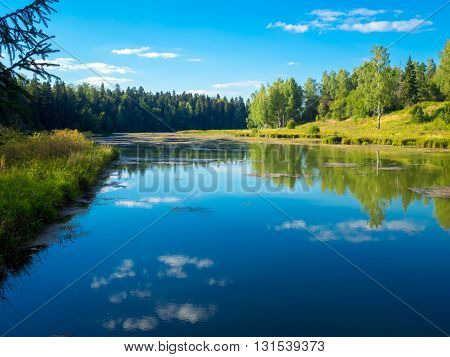 Russian summer landscape with lake and forest