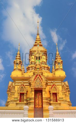 Golden pagoda with blue sky chaing mai Thailand