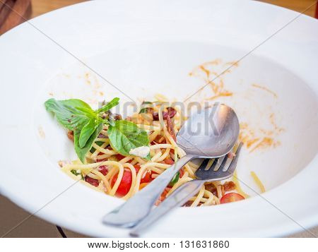 Dirty dish of spicy spaghetti after eatten