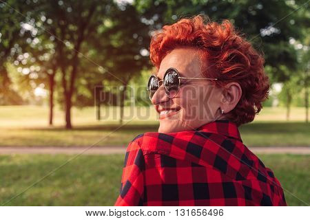 Outdoor portrait of a fifty year old woman