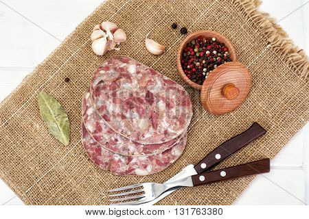 Saltisons, Brawn Homemade Ham on Wood. Studio Photo