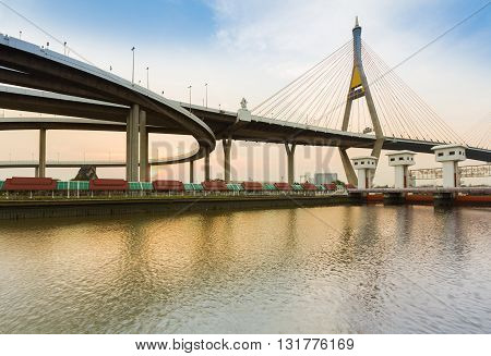 Suspension bridge connect to highway curved over watergate