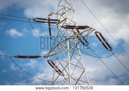 High voltage electric pole with wires line of electricity transmissions technology